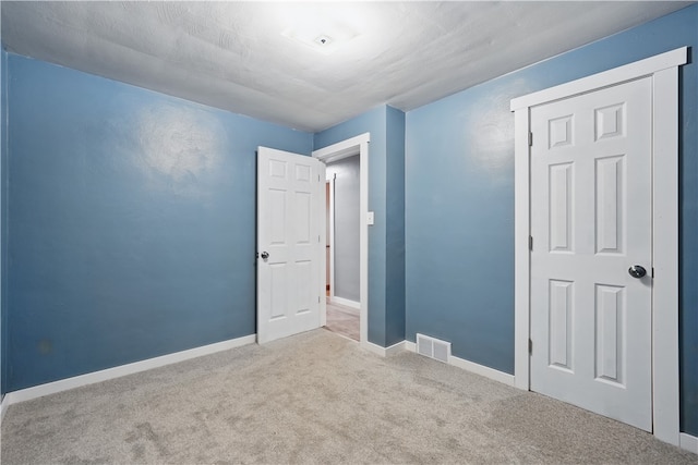 124 Plum St, Franklin Twp, PA 16117 - unfurnished bedroom with carpet flooring and baseboards