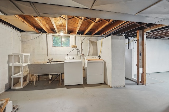124 Plum St, Franklin Twp, PA 16117 - below grade area with washing machine and clothes dryer and a sink