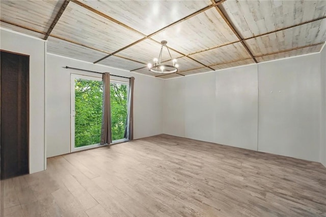 627 Seminary Ave, South Fayette, PA 15071 - unfurnished room featuring a chandelier and wood finished floors
