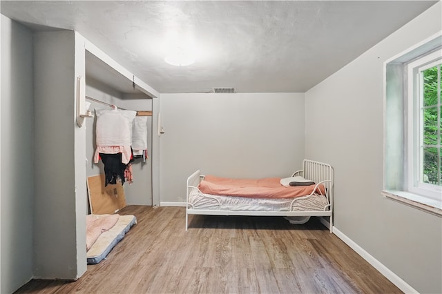 627 Seminary Ave, South Fayette, PA 15071 - bedroom with wood finished floors, baseboards, and a closet