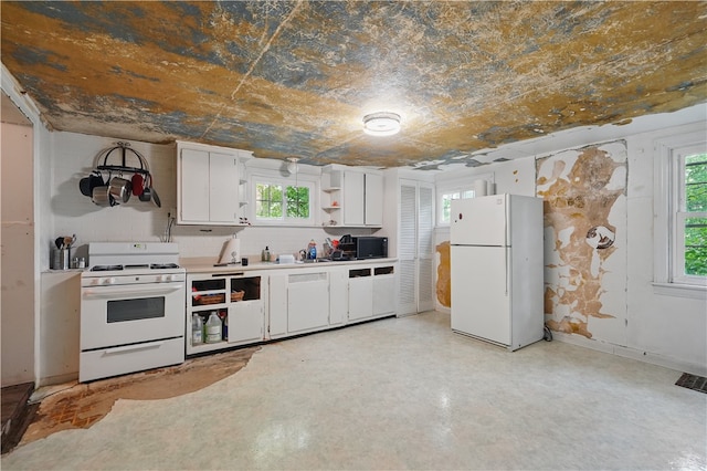 627 Seminary Ave, South Fayette, PA 15071 - kitchen with white appliances, open shelves, plenty of natural light, and white cabinetry