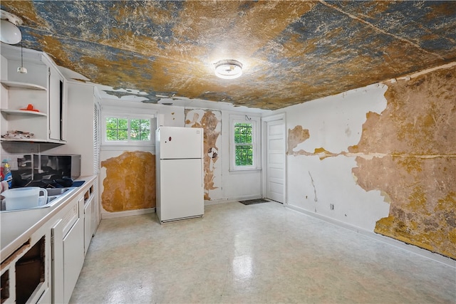627 Seminary Ave, South Fayette, PA 15071 - kitchen with freestanding refrigerator, open shelves, white cabinetry, and a sink