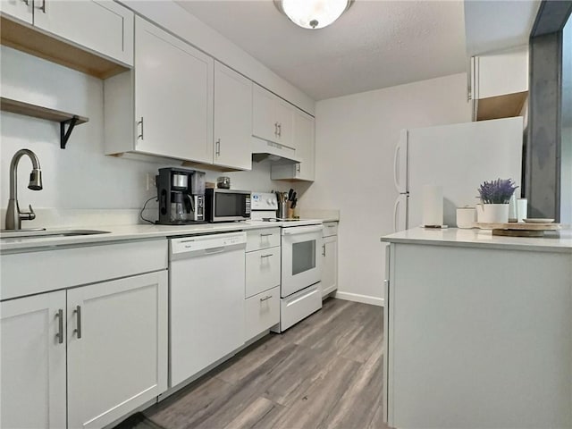 2465 Brook Ledge Rd Unit 31A, South Fayette, PA 15017 - kitchen featuring white appliances, under cabinet range hood, a sink, dark wood finished floors, and open shelves