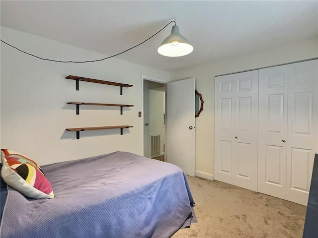 2465 Brook Ledge Rd Unit 31A, South Fayette, PA 15017 - bedroom featuring light colored carpet, a closet, and baseboards