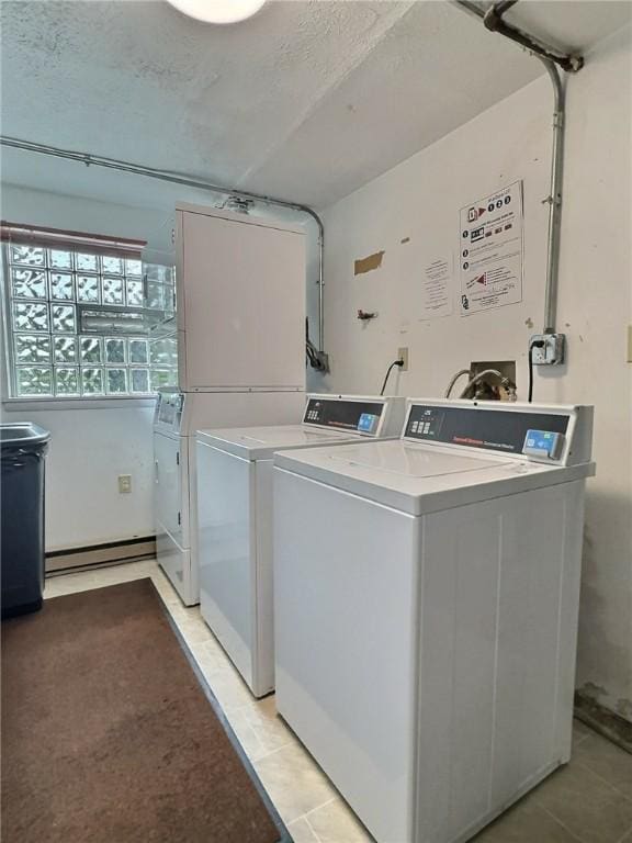 2465 Brook Ledge Rd Unit 31A, South Fayette, PA 15017 - community laundry room with separate washer and dryer, stacked washing machine and dryer, light tile patterned floors, and a textured ceiling