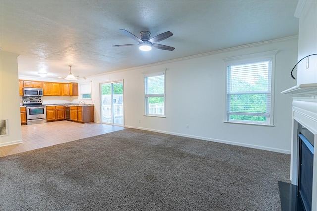 220 Chinkapin Dr, Natrona Hts/Harrison Twp, PA 15065 - unfurnished living room with ceiling fan, light carpet, ornamental molding, a fireplace with flush hearth, and baseboards