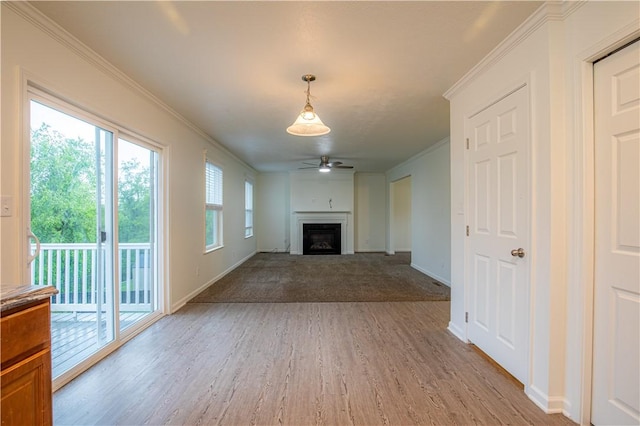 220 Chinkapin Dr, Natrona Hts/Harrison Twp, PA 15065 - unfurnished living room with light wood-style flooring, crown molding, a ceiling fan, a fireplace, and baseboards