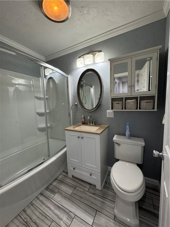 2422 Salisbury St, South Side, PA 15210 - bathroom with crown molding, vanity, toilet, a textured ceiling, and a textured wall