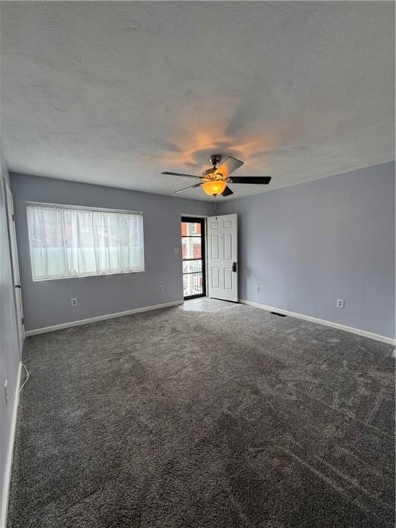 2422 Salisbury St, South Side, PA 15210 - carpeted empty room with baseboards and a ceiling fan