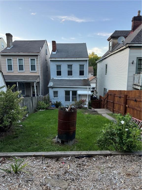 2422 Salisbury St, South Side, PA 15210 - rear view of property with a chimney