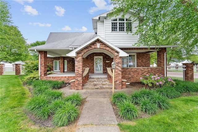 534 N Main St, Masontown, PA 15461 - view of front of home featuring brick siding and covered porch