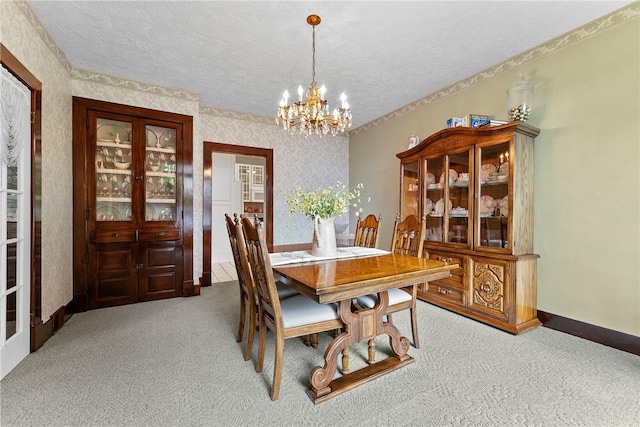 534 N Main St, Masontown, PA 15461 - dining room featuring a textured ceiling, carpet floors, a chandelier, baseboards, and wallpapered walls