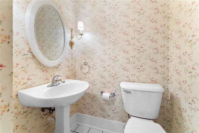 534 N Main St, Masontown, PA 15461 - half bathroom featuring tile patterned flooring, toilet, and wallpapered walls