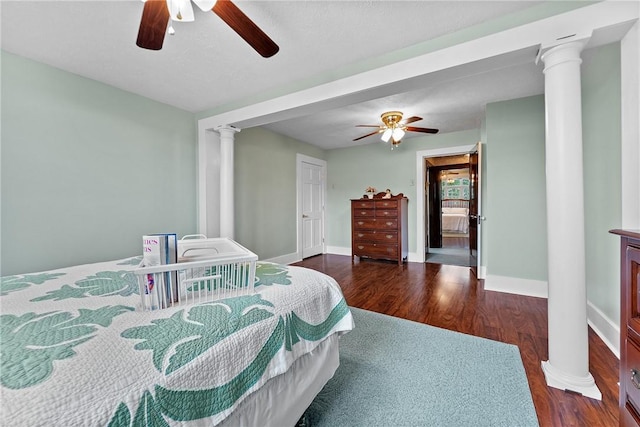 534 N Main St, Masontown, PA 15461 - bedroom with decorative columns, wood finished floors, and a ceiling fan