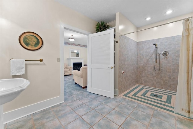 534 N Main St, Masontown, PA 15461 - full bath with tiled shower, baseboards, a fireplace, and ensuite bath