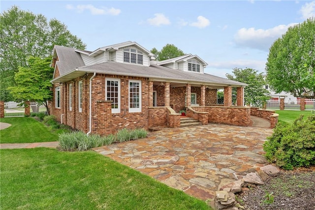 534 N Main St, Masontown, PA 15461 - view of front of house featuring brick siding and covered porch
