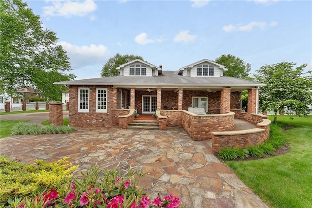 534 N Main St, Masontown, PA 15461 - view of front facade with brick siding and a patio area