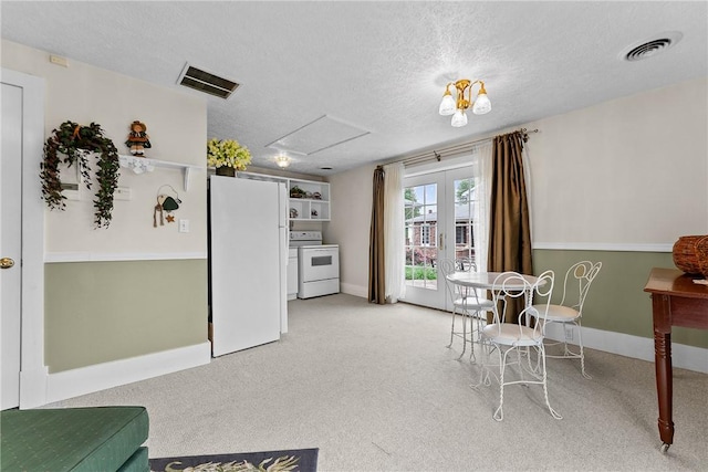 534 N Main St, Masontown, PA 15461 - dining space with light colored carpet, a textured ceiling, baseboards, and french doors
