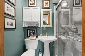 208 Kozy Cor, Middlesex Twp, PA 16059 - bathroom featuring toilet and a shower with shower door