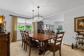 208 Kozy Cor, Middlesex Twp, PA 16059 - dining space featuring a chandelier and baseboards