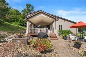 208 Kozy Cor, Middlesex Twp, PA 16059 - rear view of property with covered porch