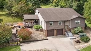208 Kozy Cor, Middlesex Twp, PA 16059 - view of front facade with stairs, a garage, and driveway