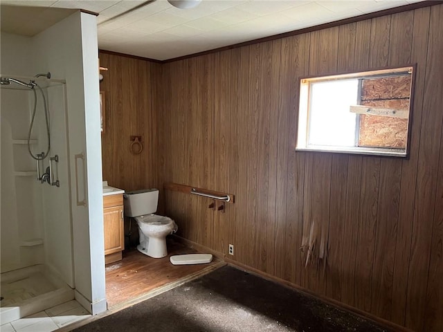505 Monongahela Ave, Glassport, PA 15045 - full bathroom with a shower stall, toilet, wood walls, and baseboards