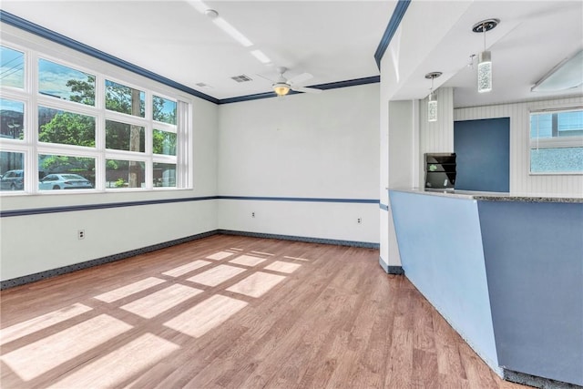 144 S 20th St, South Side, PA 15203 - spare room featuring wood finished floors, a ceiling fan, baseboards, and ornamental molding