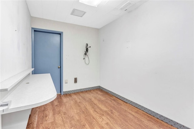 144 S 20th St, South Side, PA 15203 - spare room with wood finished floors and baseboards