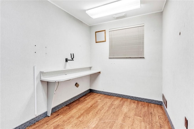 144 S 20th St, South Side, PA 15203 - washroom with ornamental molding, wood finished floors, and baseboards