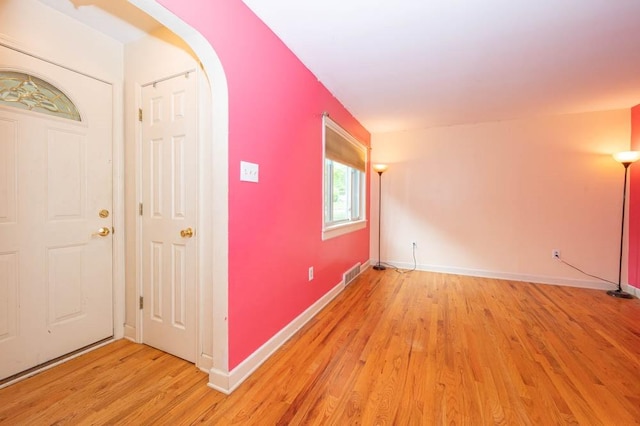 117 Derby Way, Aliquippa, PA 15001 - foyer with light wood-style floors, baseboards, and arched walkways