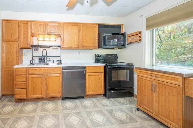 117 Derby Way, Aliquippa, PA 15001 - kitchen with black appliances, a sink, light countertops, and ceiling fan
