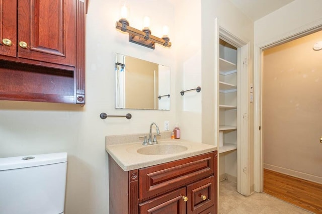 117 Derby Way, Aliquippa, PA 15001 - bathroom featuring vanity, toilet, baseboards, and tile patterned flooring