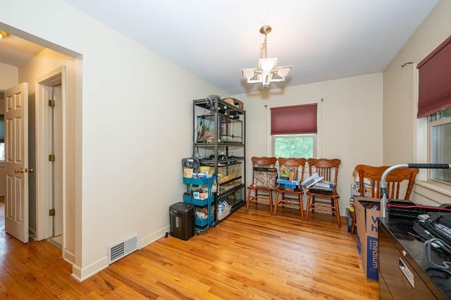 117 Derby Way, Aliquippa, PA 15001 - dining area featuring light wood finished floors, a chandelier, and baseboards