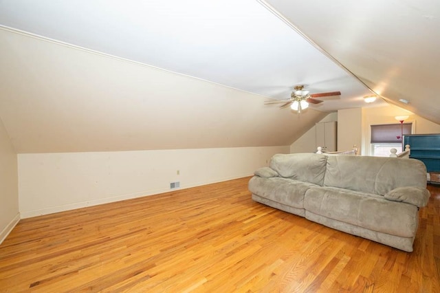 117 Derby Way, Aliquippa, PA 15001 - living room with wood finished floors, a ceiling fan, vaulted ceiling, and baseboards