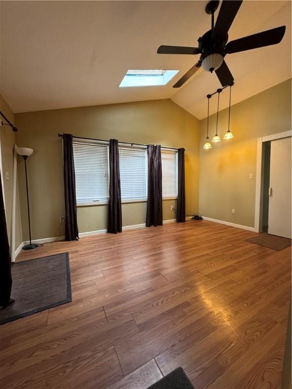 29 Old Mine Rd, Center Twp/Homer Cty, PA 15748 - empty room with a skylight, lofted ceiling, ceiling fan, wood finished floors, and baseboards