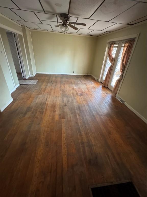 29 Old Mine Rd, Center Twp/Homer Cty, PA 15748 - empty room with a ceiling fan, a paneled ceiling, dark wood finished floors, and baseboards