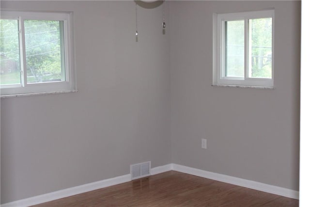 1502 Orchard Dr, Unity Twp, PA 15601 - unfurnished room featuring baseboards and wood finished floors