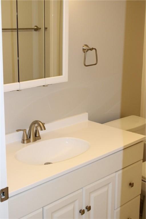 1502 Orchard Dr, Unity Twp, PA 15601 - bathroom featuring toilet and vanity