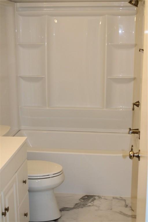 1502 Orchard Dr, Unity Twp, PA 15601 - full bath featuring marble finish flooring, vanity, toilet, and bathing tub / shower combination