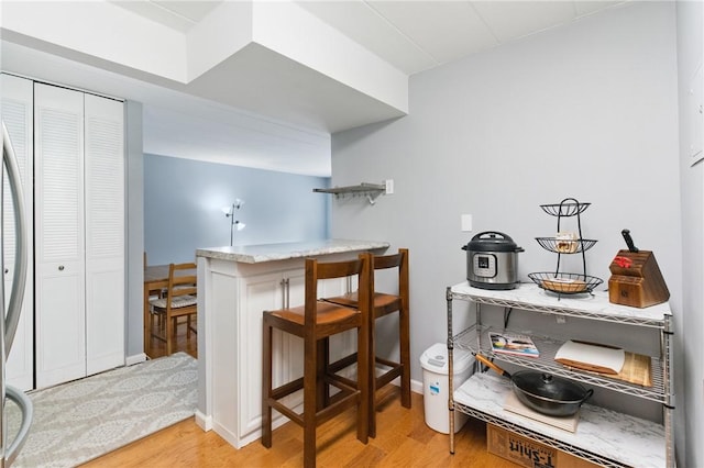5 Bayard Rd Unit 206, Shadyside, PA 15213 - bar featuring light wood finished floors and baseboards