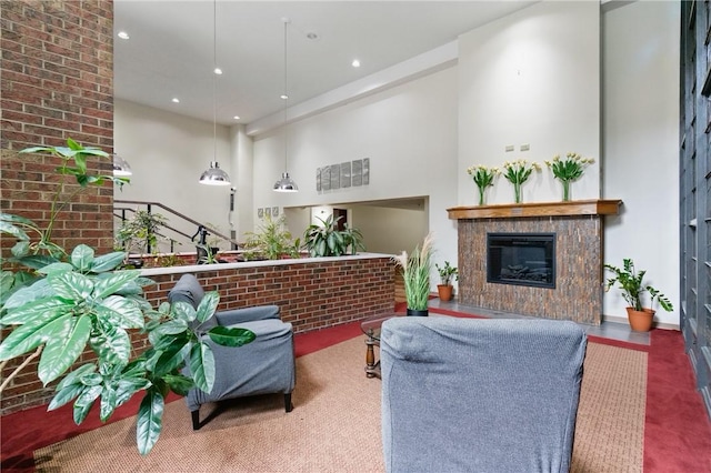 5 Bayard Rd Unit 206, Shadyside, PA 15213 - living area with a glass covered fireplace, recessed lighting, and a high ceiling