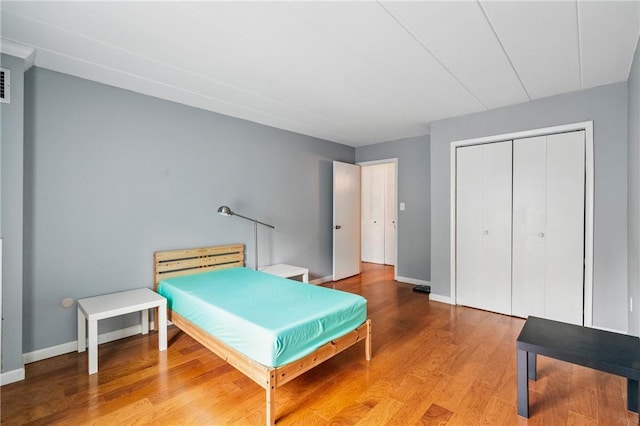 5 Bayard Rd Unit 206, Shadyside, PA 15213 - bedroom with a closet, wood finished floors, and baseboards