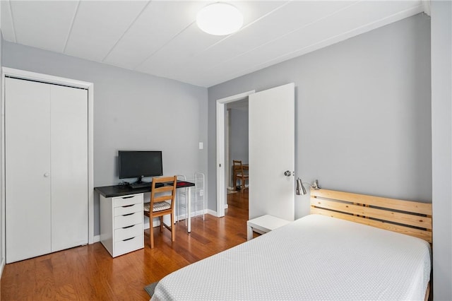 5 Bayard Rd Unit 206, Shadyside, PA 15213 - bedroom with wood finished floors, a closet, baseboards, and a desk