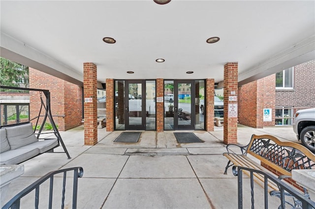 5 Bayard Rd Unit 206, Shadyside, PA 15213 - doorway to property with brick siding and a patio area