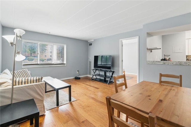 5 Bayard Rd Unit 206, Shadyside, PA 15213 - living room with light wood-style flooring and baseboards
