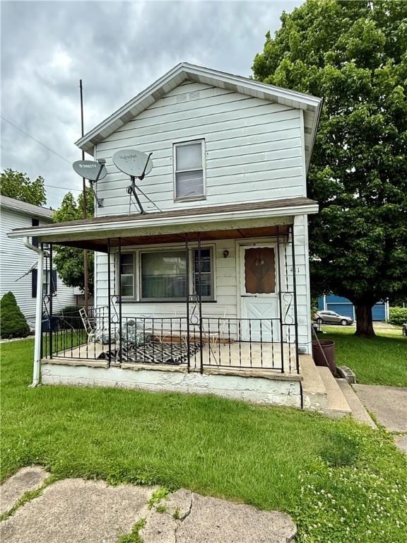 411 E Ave, Luzerne Twp, PA 15413 - view of front of home featuring a porch and a front yard