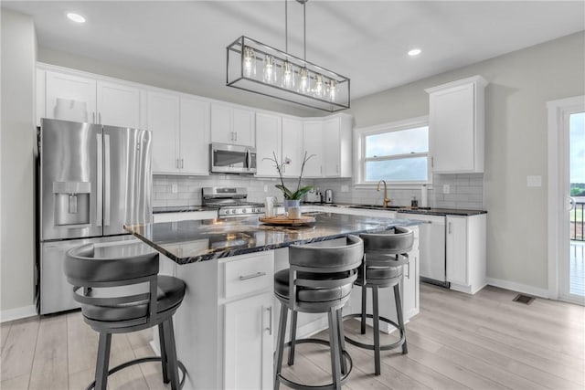 159 Twin Oaks Dr, Buffalo Twp But, PA 16055 - kitchen with appliances with stainless steel finishes, a sink, light wood-style floors, white cabinets, and recessed lighting