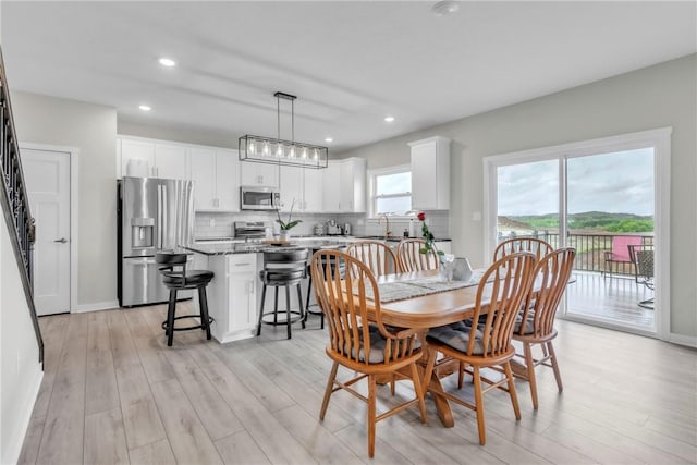 159 Twin Oaks Dr, Buffalo Twp But, PA 16055 - dining space with light wood finished floors, recessed lighting, and baseboards