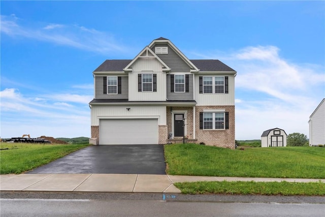 159 Twin Oaks Dr, Buffalo Twp But, PA 16055 - view of front of home featuring brick siding, driveway, and a front yard